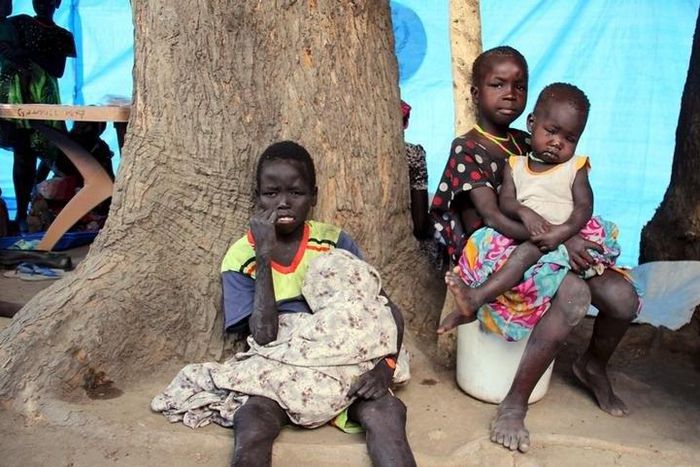 South Sudanese children sit outside their makeshift shelter in SPLA-IO rebel control area in the Southern part of Unity State Paynjiar County, March 20, 2015. Picture taken March 20, 2015. REUTERS/Denis Dumo