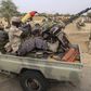 Chadian soldiers drive a pickup truck with anti-aircraft weaponry mounted on it in the recently retaken town of Damasak, Nigeria, March 18, 2015.    REUTERS/Emmanuel Braun