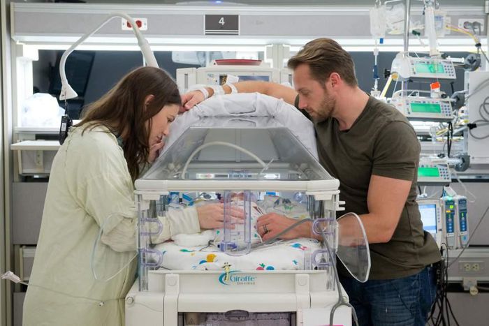 Parents of the girls gaze in awe