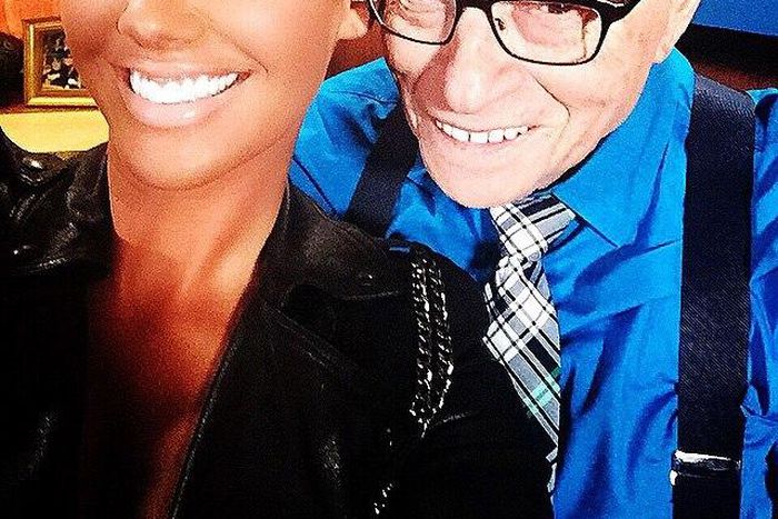 Amber Rose and Larry King enjoy a selfie together