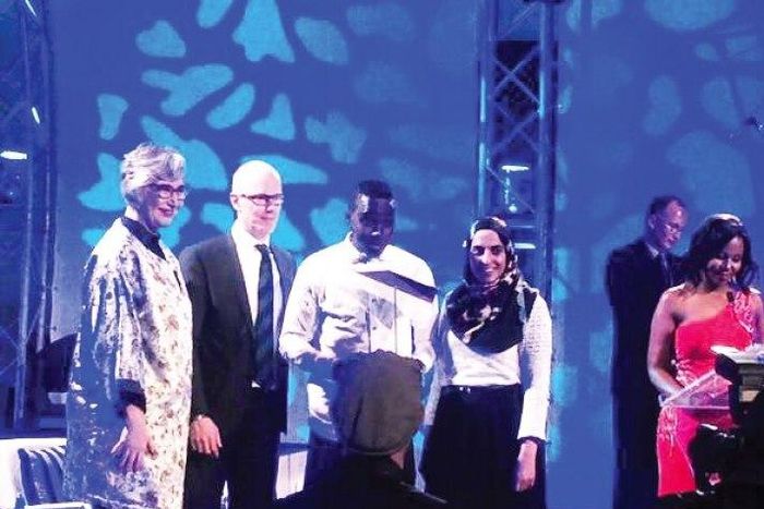 Gideon Appah (third from left) speaking at the awards ceremony in Johannesburg