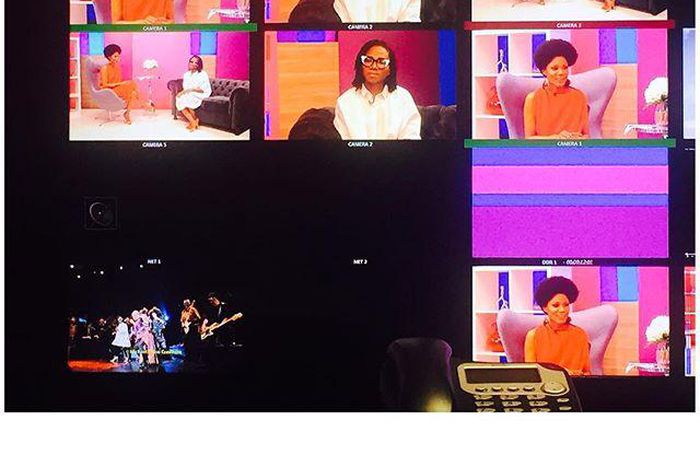 Funmi Iyanda alongside Asa on set