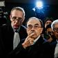 Cardinal Barbarin flanked by lawyers as he arrives in court in Lyon