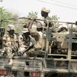 Soldiers are seen on a truck in Maiduguri in Borno State, Nigeria May 14, 2015. REUTERS/Stringer