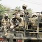 Soldiers are seen on a truck in Maiduguri in Borno State, Nigeria May 14, 2015. REUTERS/Stringer