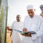President Muhammadu Buhari and his son Yusuf, during a visit to the President's farm in Daura, Katsina State.