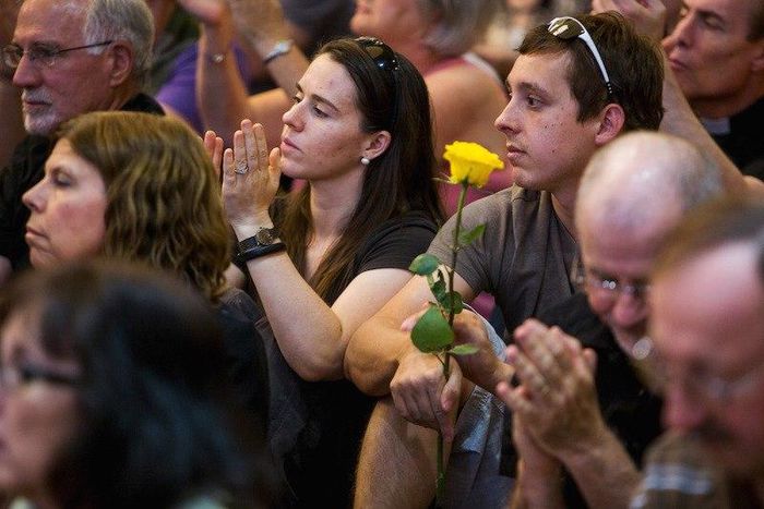 Attendees listen as speakers from different faiths speak at an interfaith rally titled “Love is Stronger than Hate” at the Islamic Community Center in Phoenix, June 1, 2015. The rally was held in response to an earlier anti-Muslim rally at the same loc...