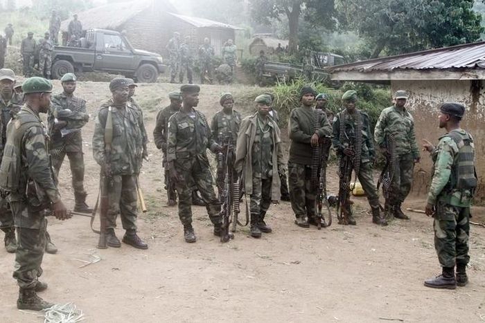 Congolese soldiers from the Armed Forces of the Democratic Republic of Congo (FARDC) receive instructions during their offence against the rebels from the Democratic Forces for the Liberation of Rwanda (FDLR) in Kirumba village of Rutshuru territory in...