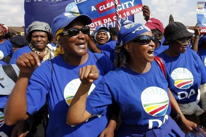 Democratic Alliance (DA) supporters chant slogans during an election campaign in Soweto May 6, 2011. South Africans will vote in municipal elections on May 18, 2011. REUTERS/Siphiwe Sibeko