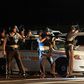 Gunshots heard as Ferguson protests turn violent a year after Brown shooting