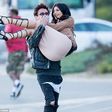 Kylie Jenner swept off her feet on Malibu beach