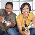 Young black couple playing video games