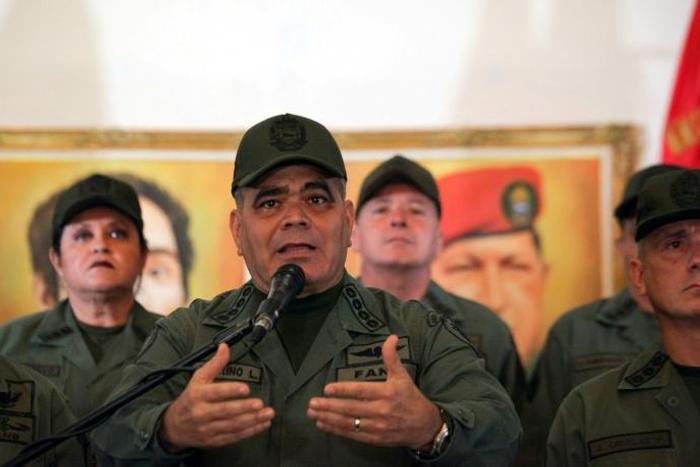 Venezuela's defence minister, General Vladimir Padrino reads out a statement from the armed forces declaring 'absolute loyalty' to President Nicolas Maduro
