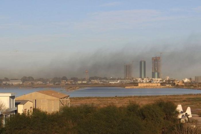 Smoke rises after an airstrike hit Maitiga airport early Thursday morning, in Tripoli March 5, 2015.  REUTERS/Hani Amara