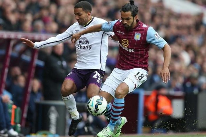 Everton's Aaron Lennon and Aston Villa's Kieran Richardson in action. Action Images via Reuters / Matthew Childs