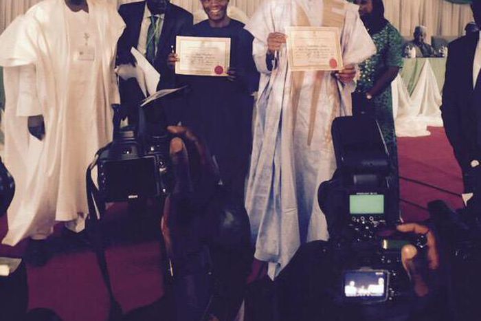 President-elect, Muhammadu Buhari and Vice President-elect, Yemi Osinbajo collect Certificates of Return from INEC Chairman, Attahiru Jega