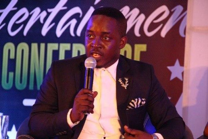 M.I speaking at the Nigerian Entertainment Conference