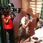 DJ Tee giving Funky Mallam instructions as the director of photography shoots a scene