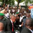 Excited youths surround President Muhammadu Buhari in Abuja on July 17, 2015.