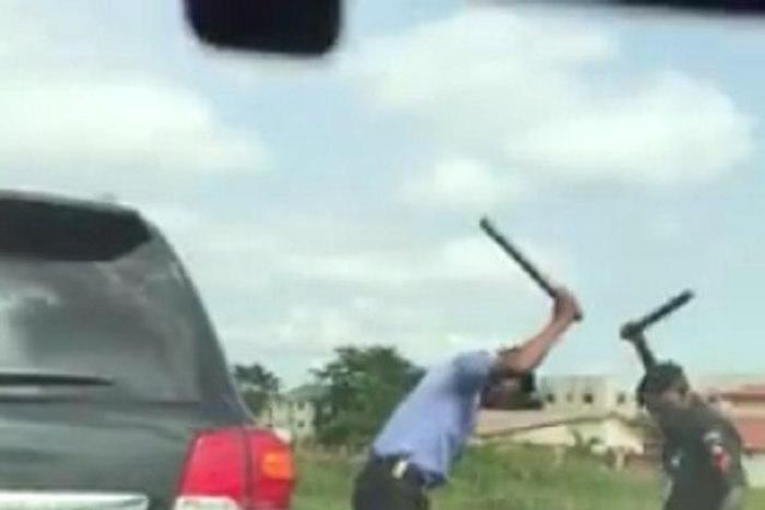 Nigerian police brutalizing 'stubborn' driver