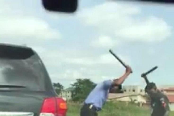 Nigerian police brutalizing 'stubborn' driver
