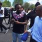 Wale discussing with residents of Baltimore