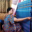 An Akwete weaver with her apprentice