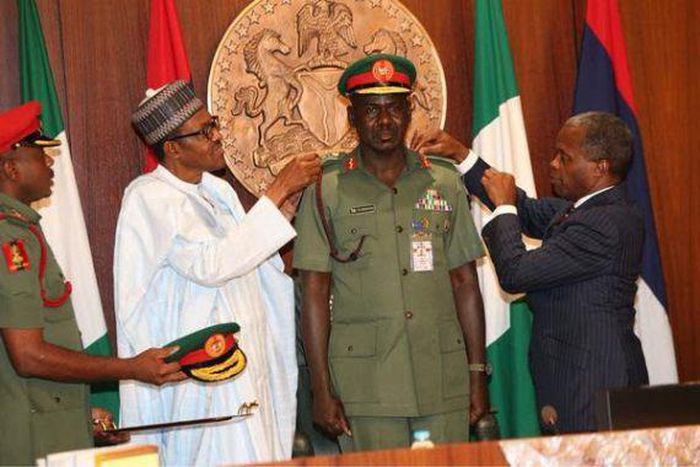 President Muhammadu Buhari decorates new service chiefs on August 13, 2015.
