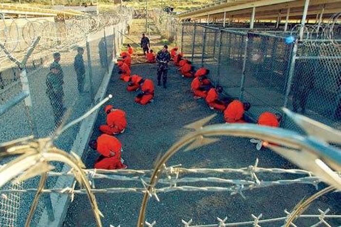 Some Guantanamo inmates would go to U.S. under new plan -Obama aide