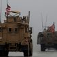 A line of US military vehicles in Syria's northern city of Manbij on December 30, 2018