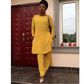 Waje's matching tunic set is chic
