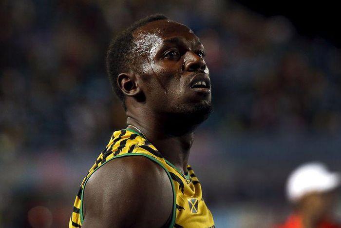 Usain Bolt of Jamaica reacts after Jamaica placed second behind the U.S. in the 4x100 meters race at the IAAF World Relays Championships in Nassau, Bahamas, May 2, 2015. Japan placed third.