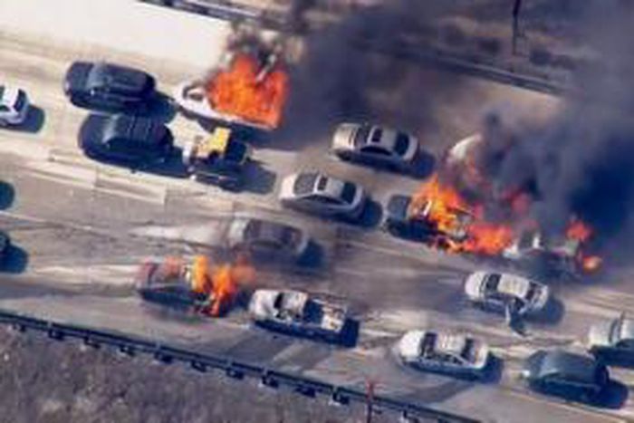 Wildfire overruns packed California freeway, burns cars
