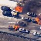 Wildfire overruns packed California freeway, burns cars