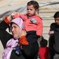 Britain says will take in hundreds more women and children from Syria