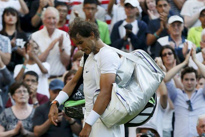 Rafael Nadal of Spain prepares to walk off court after losing his match against Dustin Brown of Germany at the Wimbledon Tennis Championships in London, July 2, 2015.           REUTERS/Stefan Wermuth