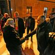 A member of the Palestinian Authority (R) shakes hands with Tawfiq Abu Naim (L), director general of the internal security forces in Gaza at the Rafah border crossing with Egypto, on January 7, 2019