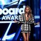 Chrissy Teigen on stage of the Billboard Music Awards 2015