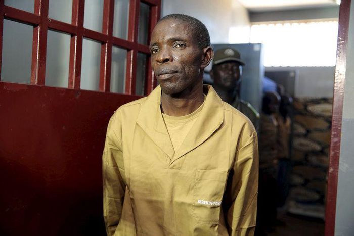 Sect leader Jose Kalupeteka is escorted by police in Huambo, Angola, in this picture taken May 5, 2015. The details of a police raid on April 16 in the remote hills of central Huambo province have been fiercely contested, sharpening the divide between ...