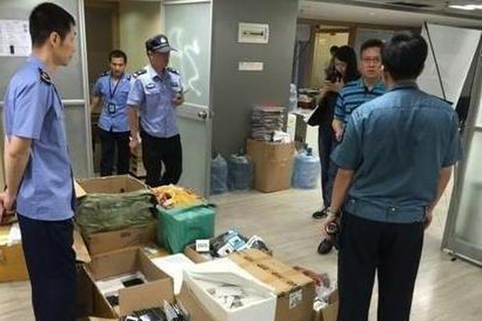 Officials at the Uber office in Guanghzhou