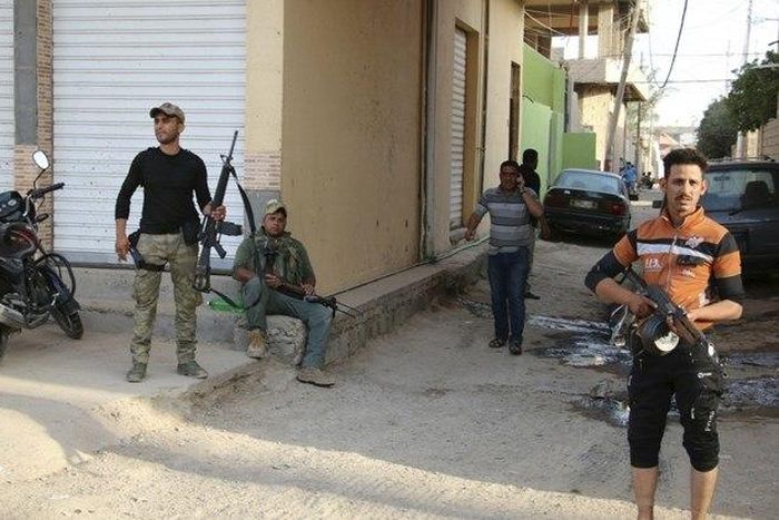 U.S.-led forces launch 16 air strikes against militant group in Iraq