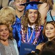 Mildred, Joseph Baena and a friend at the graduation ceremony