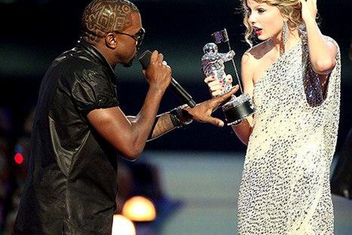 Taylor Swift and Kanye West on stage of the MTV VMAs, where their beef was born, after Kanye interrupted Swift's speech