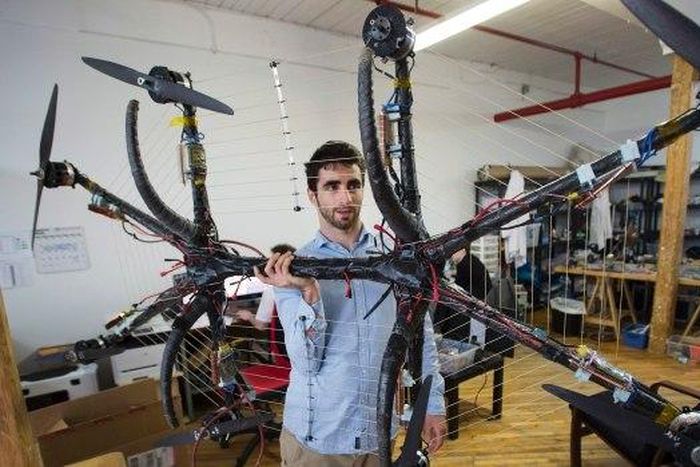 Duru, with his record breaking hoverboard modeled from a drone