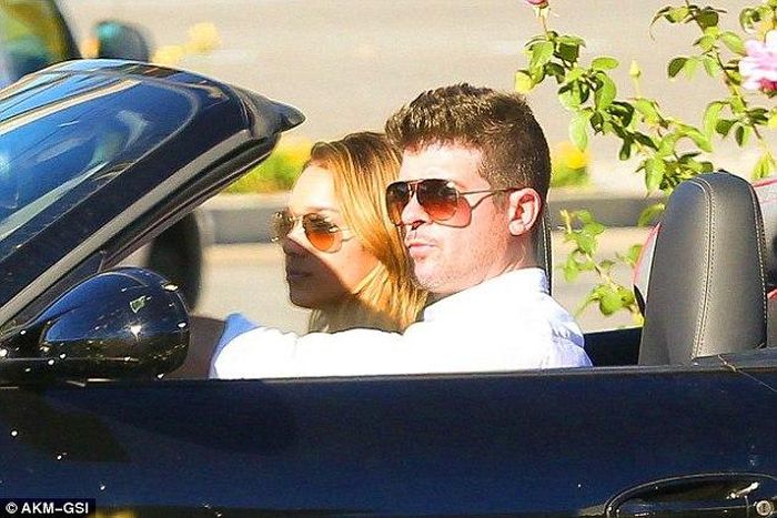 Robin Thicke and April Love Geary