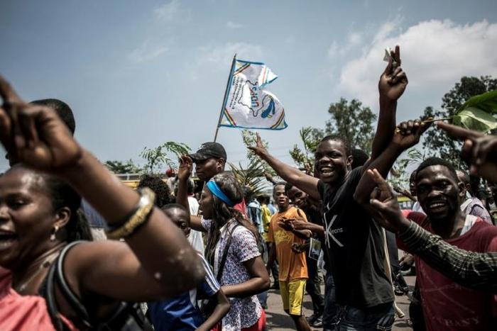 Supporters of Felix Tshisekedi celebrate after he was named winner of DR Congo's presidential election, while elsewhere supporters of Martin Fayulu took to the streets in protest