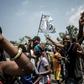 Supporters of Felix Tshisekedi celebrate after he was named winner of DR Congo's presidential election, while elsewhere supporters of Martin Fayulu took to the streets in protest