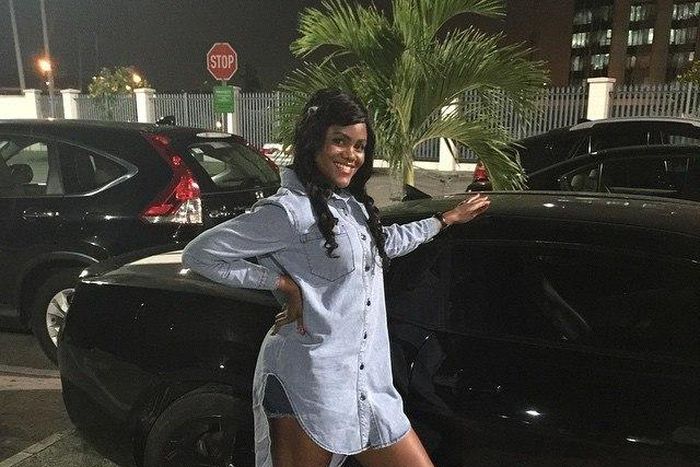 Busola Dakolo sports a boyfriend shirt over shorts and high top sneakers