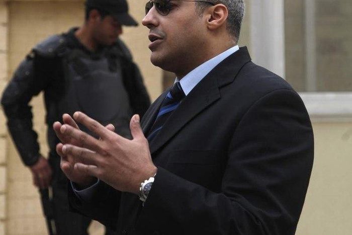 Al Jazeera journalist Mohamed Fahmy is seen outside of a court before a hearing in his trial in Cairo, February 23, 2015.     REUTERS/Asmaa Waguih