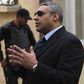 Al Jazeera journalist Mohamed Fahmy is seen outside of a court before a hearing in his trial in Cairo, February 23, 2015.     REUTERS/Asmaa Waguih